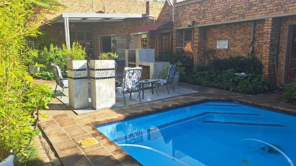 Dormio Manor Guest Lodge Secunda Extérieur photo